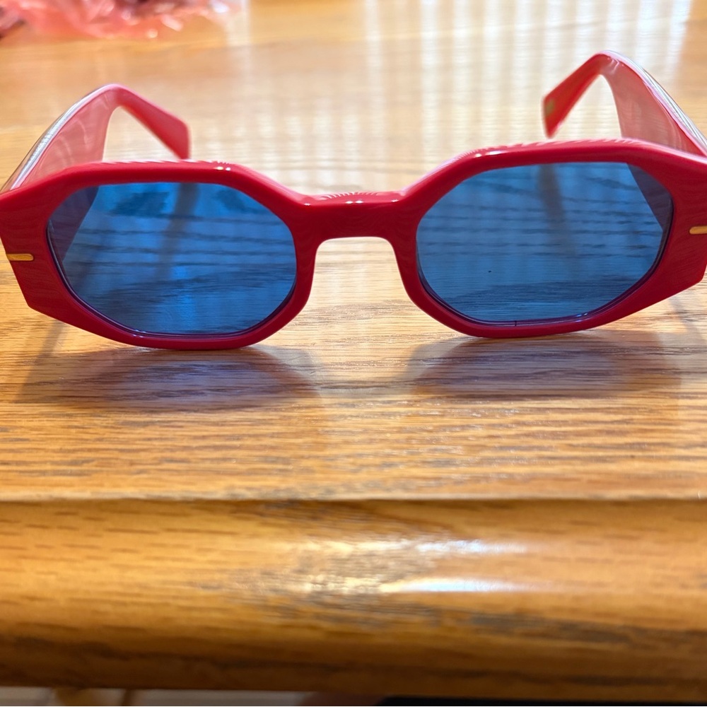 SEE hot pink sunglasses